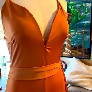 Gorgeous jumpsuit ! You tryin to get laid or paid this is magic maker for you